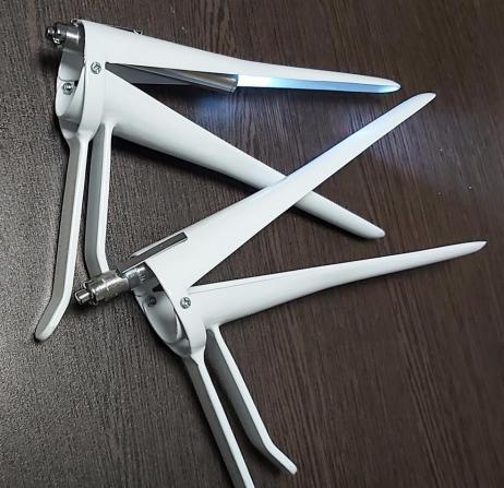 عرضه کننده اسپیکولوم چراغ قوه دار